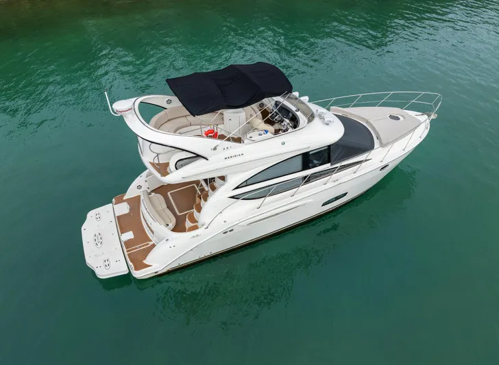 Crescendo Yacht Photos Pics 2012 Meridian Sedan Bridge yacht on clear water.