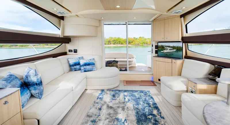 Crescendo Yacht Photos Pics Luxurious interior of a 2012 Meridian Sedan Bridge yacht with modern furnishings.