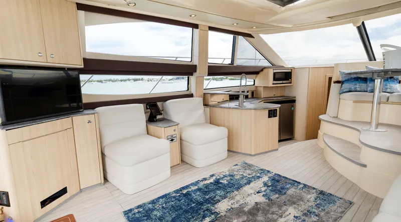 Crescendo Yacht Photos Pics Luxurious interior of a 2012 Meridian Sedan Bridge yacht with modern furnishings.