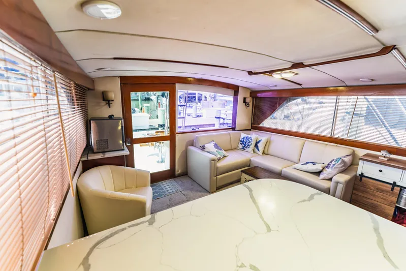  Yacht Photos Pics Luxurious interior of 1984 Ocean Yachts 46, featuring elegant seating and modern decor.