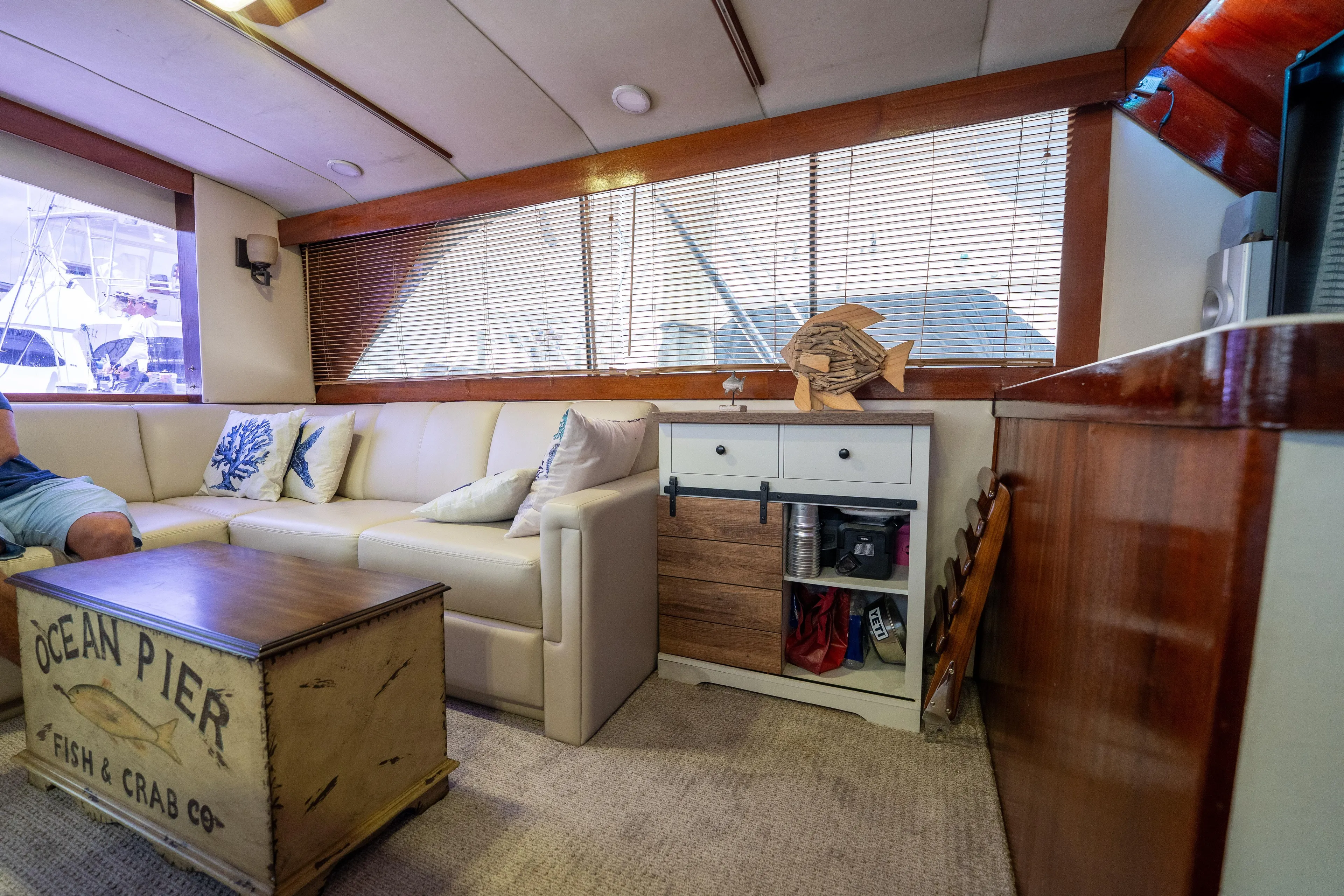  Yacht Photos Pics Interior of 1984 Ocean Yachts 46 with cozy seating and nautical decor.