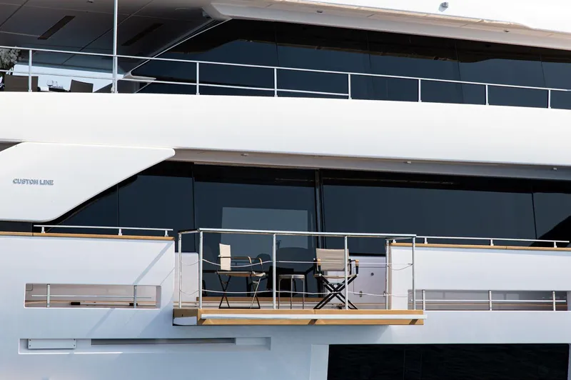 Haiami Yacht Photos Pics Luxury yacht Custom Line Navetta 33, 2022 model, featuring sleek design and outdoor seating area.
