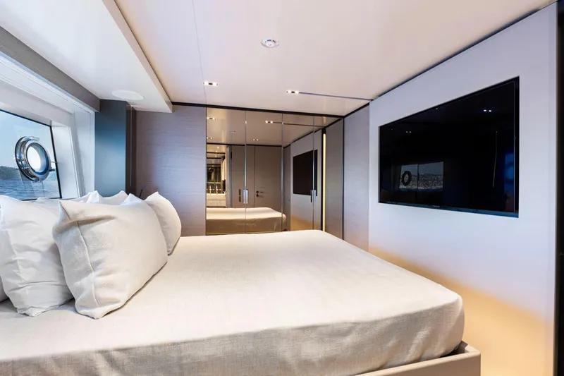 Haiami Yacht Photos Pics Luxurious bedroom interior of 2022 Custom Line Navetta 33 yacht with modern design.