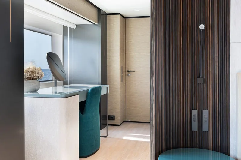 Haiami Yacht Photos Pics Luxurious interior of 2022 Custom Line Navetta 33 yacht with modern furnishings and elegant design.