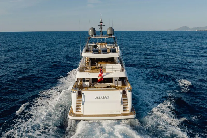 Haiami Yacht Photos Pics Custom Line Navetta 33 yacht cruising on open sea, 2022 model, rear view.