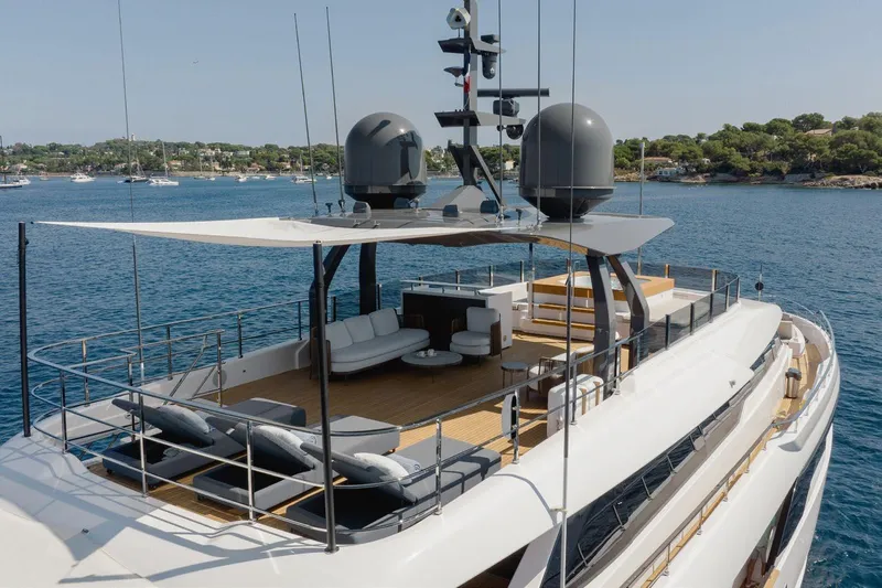 Haiami Yacht Photos Pics Luxurious 2022 Custom Line Navetta 33 yacht with spacious deck and modern amenities.