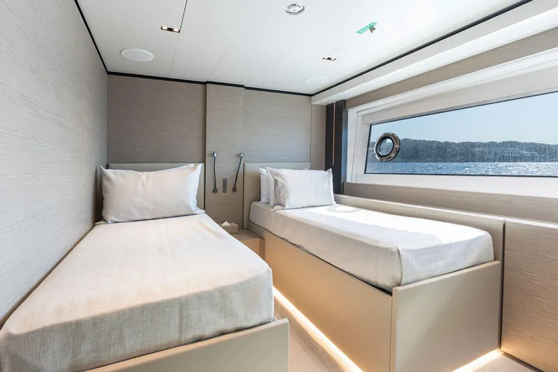 Haiami Yacht Photos Pics Luxurious twin bedroom on 2022 Custom Line Navetta 33 yacht with ocean view.
