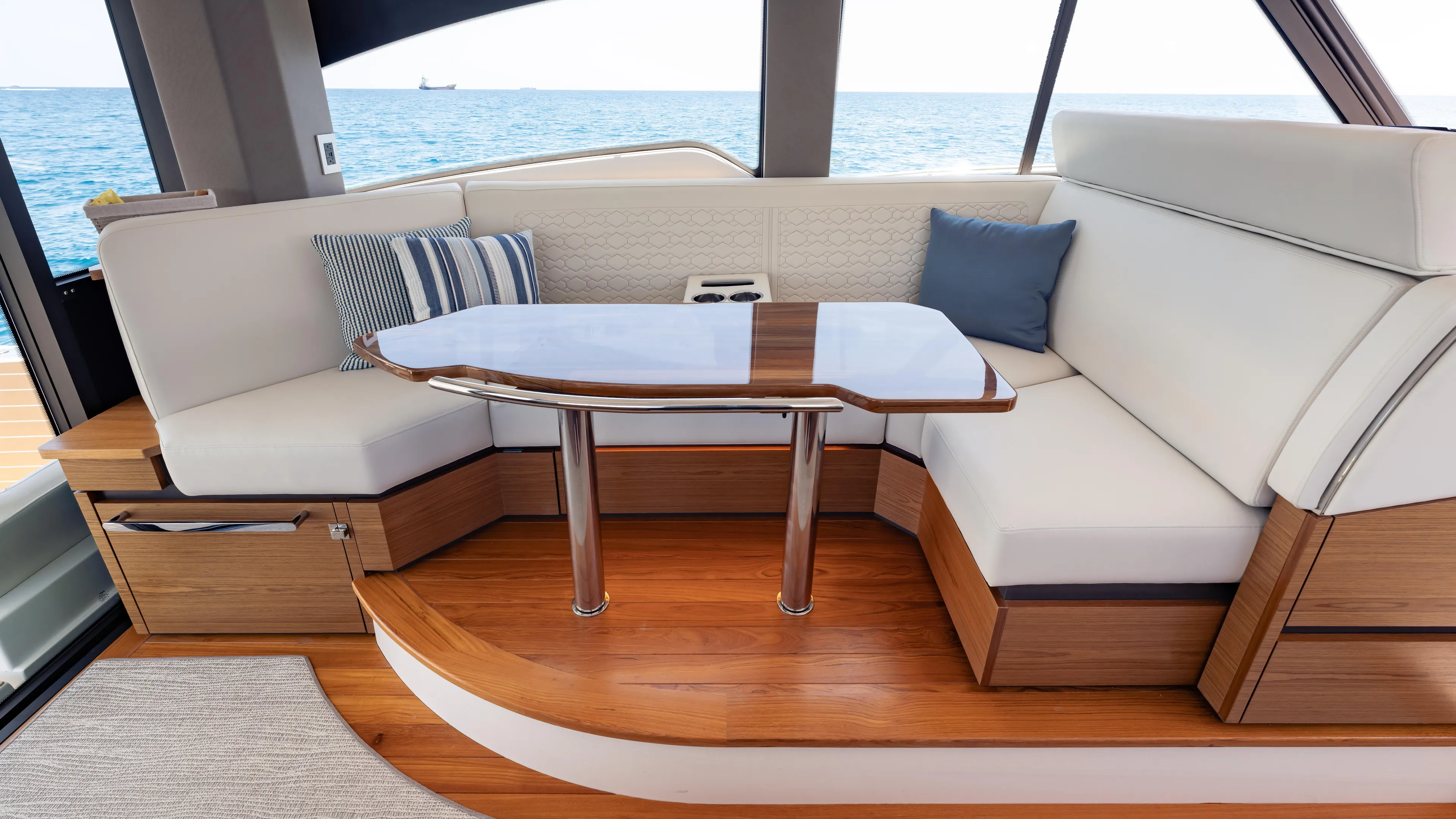  Yacht Photos Pics Luxurious interior of 2024 Tiara Yachts 48 LE with elegant seating and ocean view.