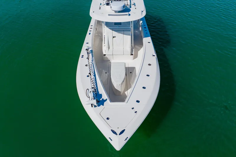  Yacht Photos Pics 2025 SeaVee 370Z boat on clear green water, aerial view.