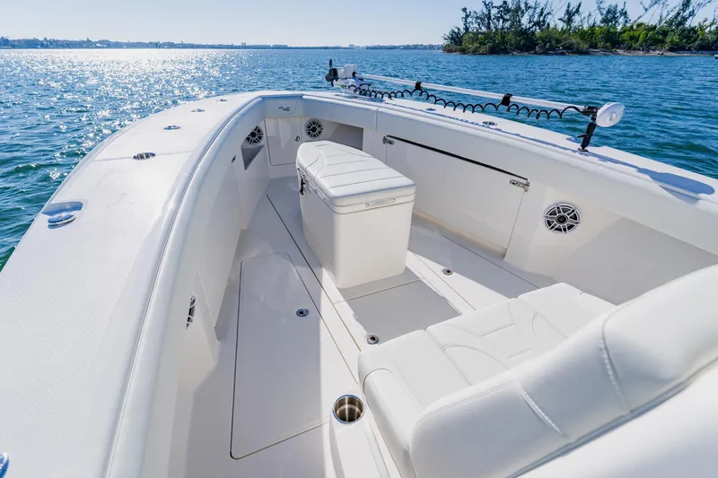  Yacht Photos Pics 2025 SeaVee 370Z boat interior with seating, on a sunny day at sea.