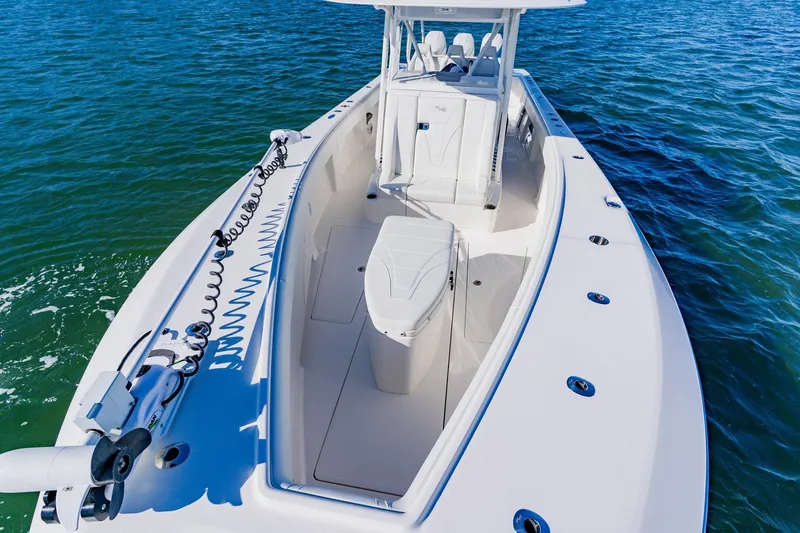  Yacht Photos Pics 2025 SeaVee 370Z boat on water, showcasing sleek design and spacious deck.