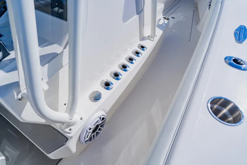  Yacht Photos Pics 2025 SeaVee 370Z boat deck with rod holders and speaker detail.