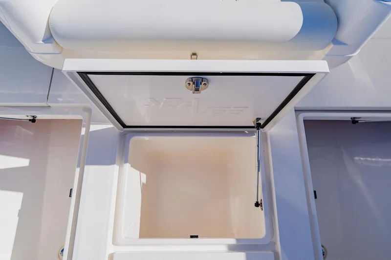  Yacht Photos Pics Open storage compartment on 2025 SeaVee 370Z boat, showcasing interior space.