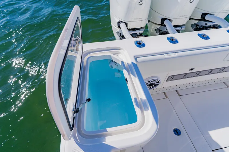  Yacht Photos Pics 2025 SeaVee 370Z boat with open livewell and powerful outboard engines.