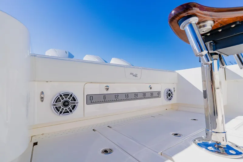  Yacht Photos Pics 2025 SeaVee 370Z boat deck with speakers and measuring scale, under clear blue sky.