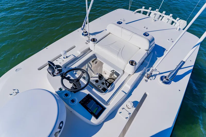  Yacht Photos Pics 2025 SeaVee 370Z boat helm with modern controls and seating on open water.