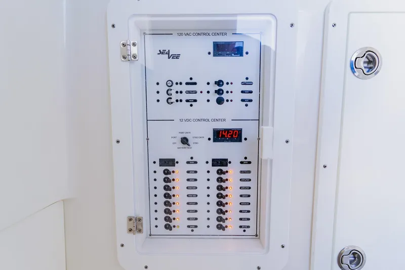  Yacht Photos Pics Control panel of 2025 SeaVee 370Z boat, featuring 120 VAC and 12 VDC systems.