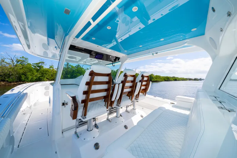  Yacht Photos Pics Interior of 2026 HCB 48 Campeon boat with luxurious seating and scenic water view.