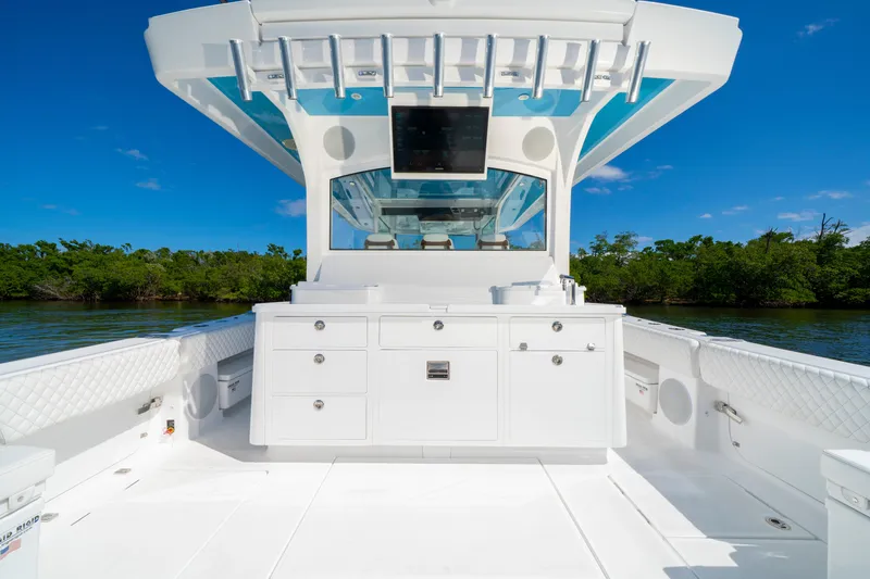  Yacht Photos Pics HCB 48 Campeon 2026 boat interior with sleek white cabinetry and blue sky backdrop.