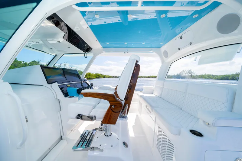  Yacht Photos Pics Interior of 2026 HCB 48 Campeon boat with luxurious seating and modern controls.