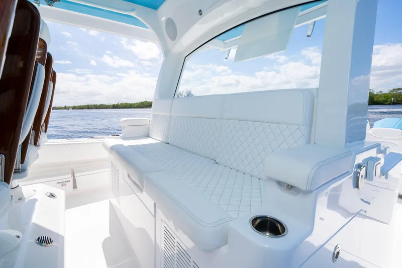  Yacht Photos Pics Luxurious seating on the 2026 HCB 48 Campeon boat, featuring elegant white upholstery.