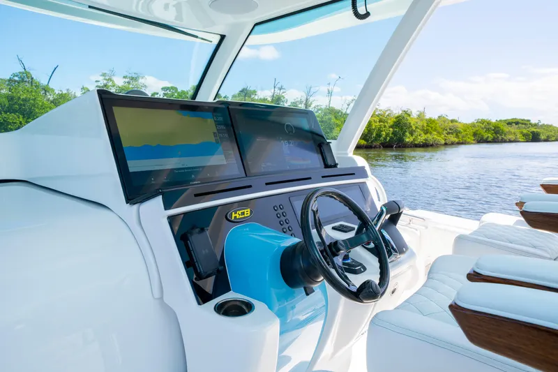  Yacht Photos Pics Helm of 2026 HCB 48 Campeon boat with modern navigation displays.