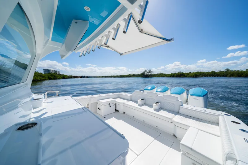  Yacht Photos Pics 2026 HCB 48 Campeon boat interior with luxurious seating and scenic water view.