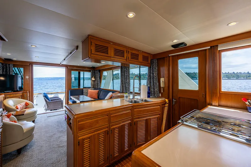 Am&eacute;lie Yacht Photos Pics Luxurious interior of 1997 Offshore Yachts 52 Sedan with scenic ocean view.