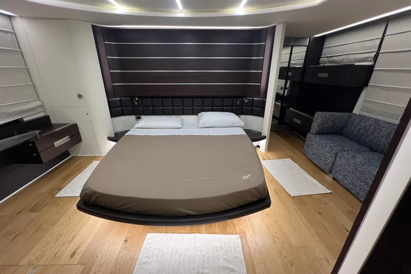 Rus&egrave; Yacht Photos Pics Luxurious bedroom interior of 2006 Azimut 86 Sport yacht with modern furnishings.