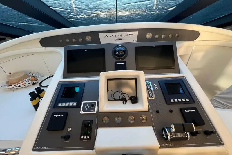 Rus&egrave; Yacht Photos Pics Control panel of a 2006 Azimut 86 Sport yacht with navigation equipment.