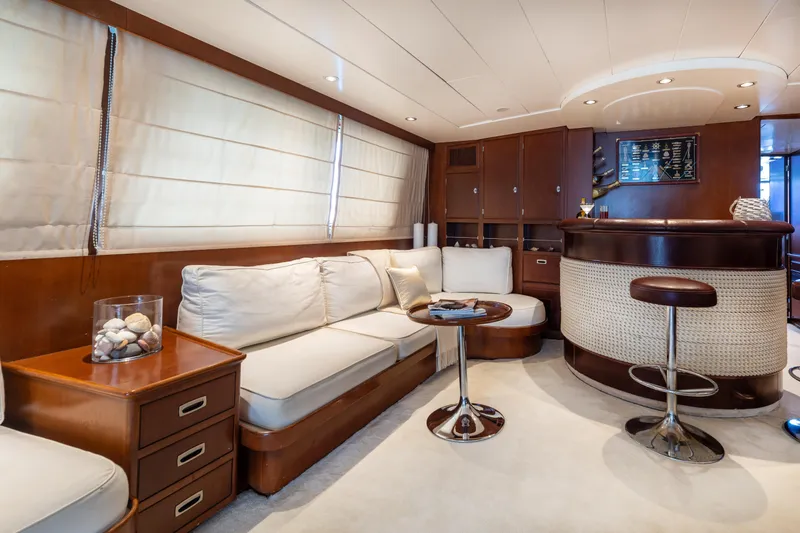 Anonymous Yacht Photos Pics Luxurious yacht interior with elegant seating and bar, Hellenic Shipyards Custom, 1981 model.