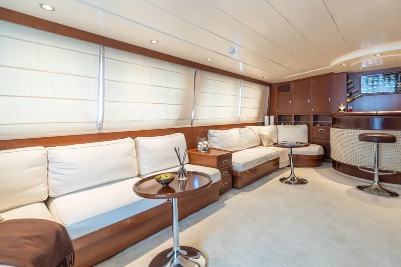 Anonymous Yacht Photos Pics Luxurious yacht interior with elegant seating and bar, Hellenic Shipyards Custom, 1981 model.