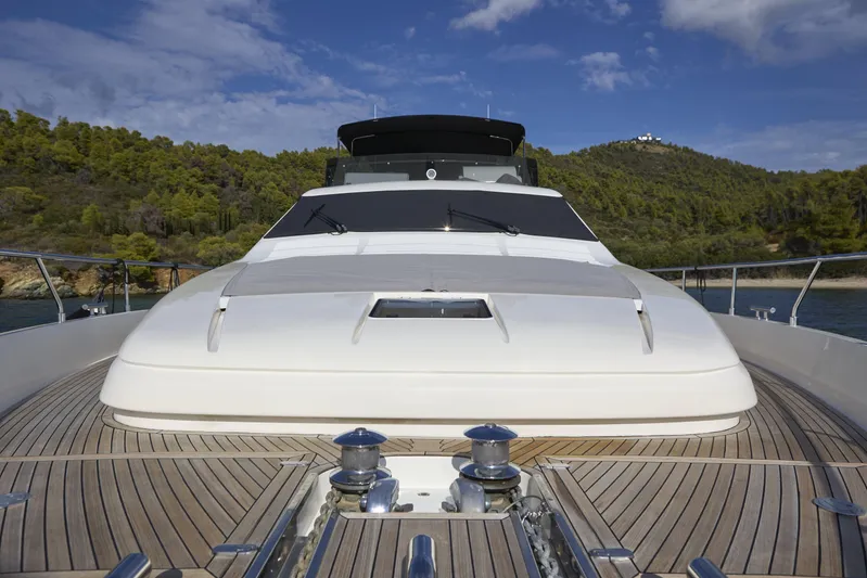  Yacht Photos Pics 2004 Ferretti Yachts 680 on water, showcasing sleek deck and scenic background.