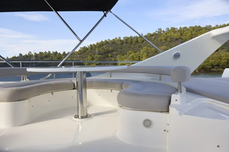  Yacht Photos Pics Luxurious seating area on 2004 Ferretti Yachts 680 with scenic water view.