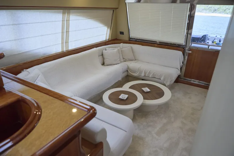  Yacht Photos Pics Luxurious interior of 2004 Ferretti Yachts 680 with plush seating and elegant decor.