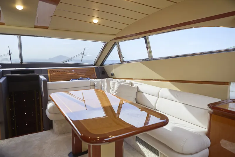  Yacht Photos Pics Luxurious interior of 2004 Ferretti Yachts 680 with elegant seating and panoramic windows.
