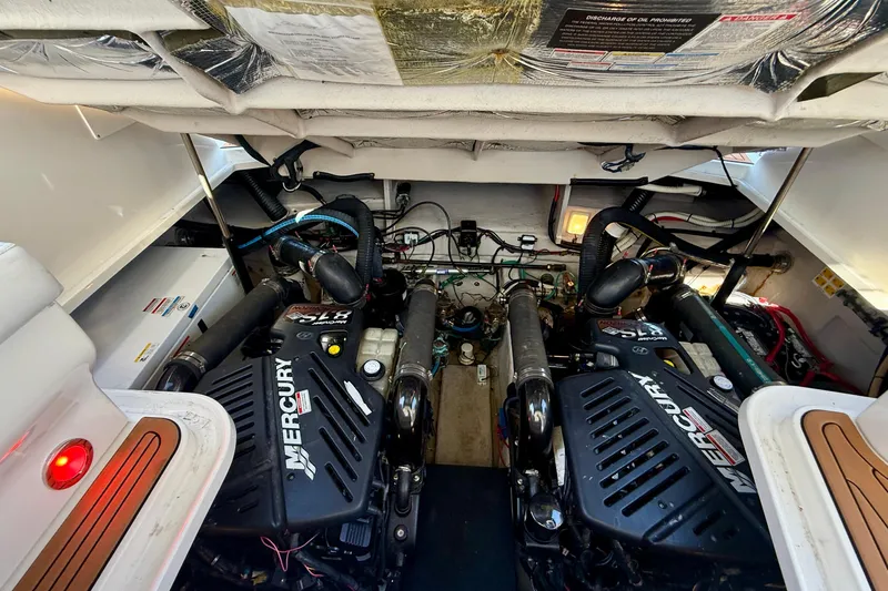 Knock On Wood Yacht Photos Pics Engine compartment of a 2008 Sea Ray 38 Sundancer with twin Mercury engines.