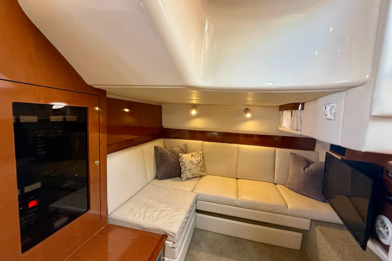 Knock On Wood Yacht Photos Pics Luxurious interior of 2008 Sea Ray 38 Sundancer yacht with cozy seating area.