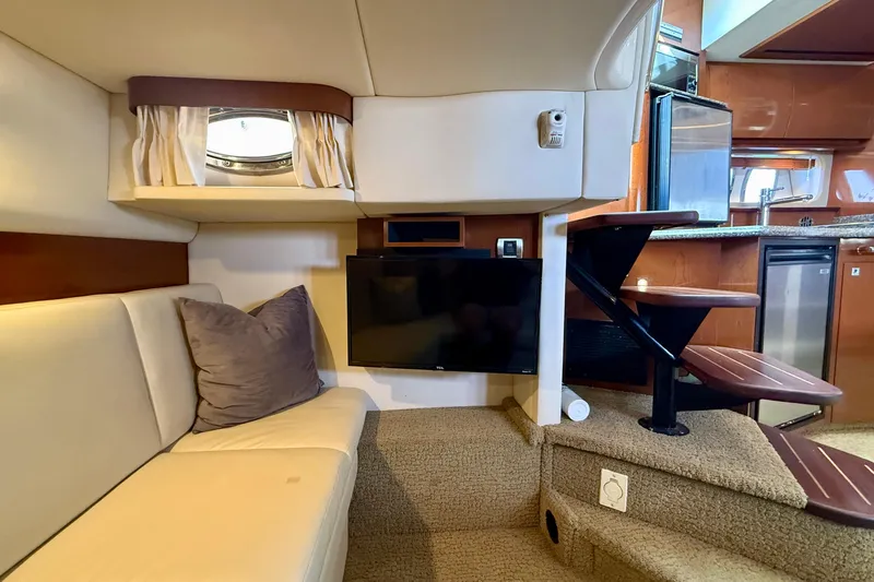 Knock On Wood Yacht Photos Pics Interior of 2008 Sea Ray 38 Sundancer yacht with cozy seating and modern amenities.