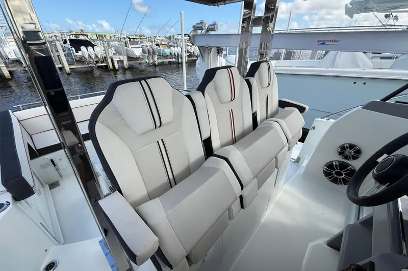  Yacht Photos Pics 2022 Jeanneau Leader 10.5 WA Series 2 boat interior with plush seating and modern design.