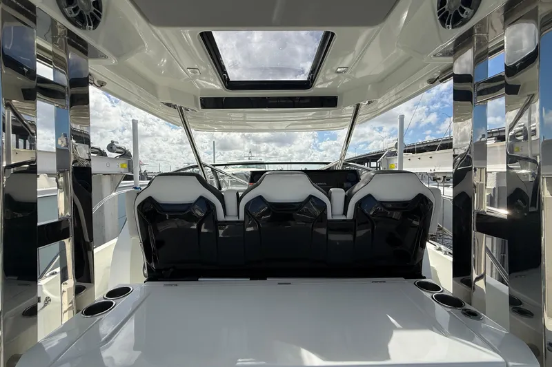  Yacht Photos Pics 2022 Jeanneau Leader 10.5 WA Series 2 boat interior with sleek seating and modern design.