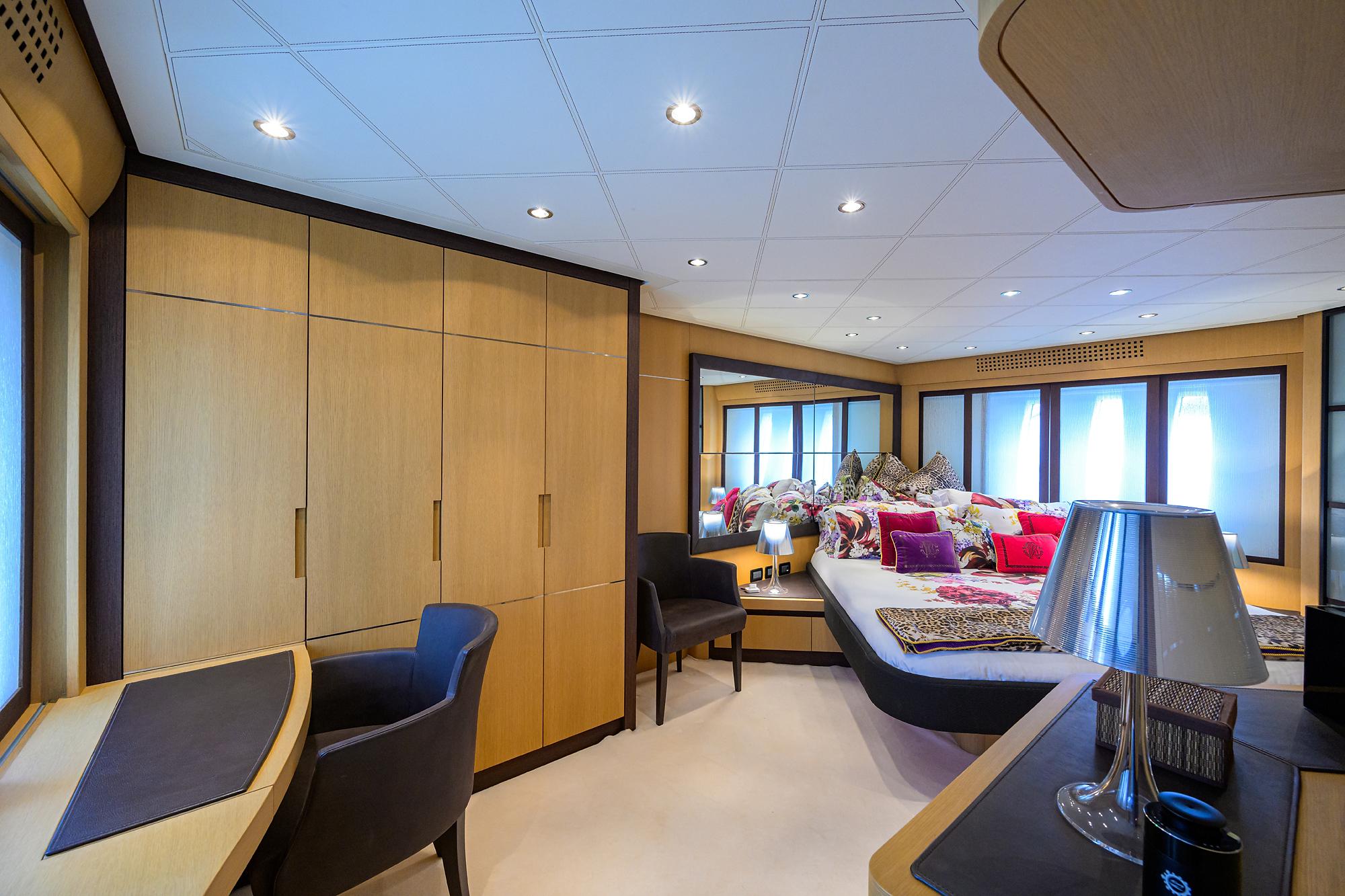 Luxurious interior of 2009 Pershing 90 Express yacht with elegant furnishings and ample natural light.