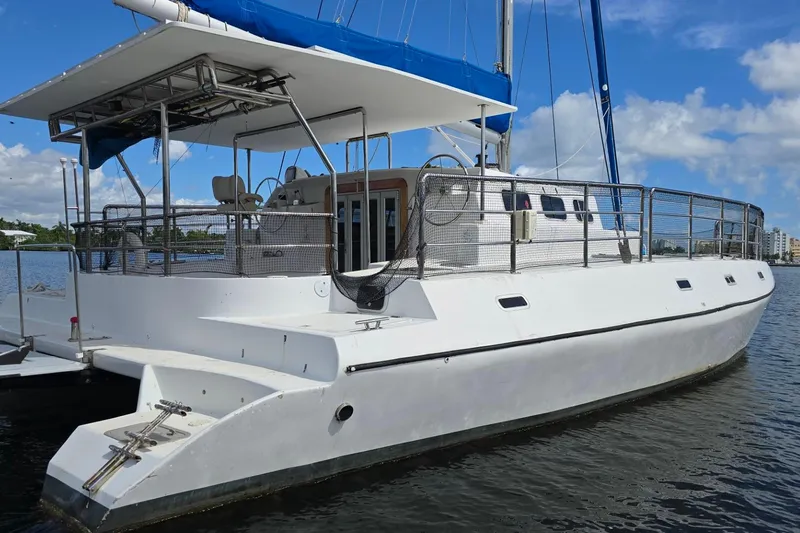  Yacht Photos Pics Custom Len Jenkins 50 sailboat, 2018 model, docked on a sunny day with blue skies.