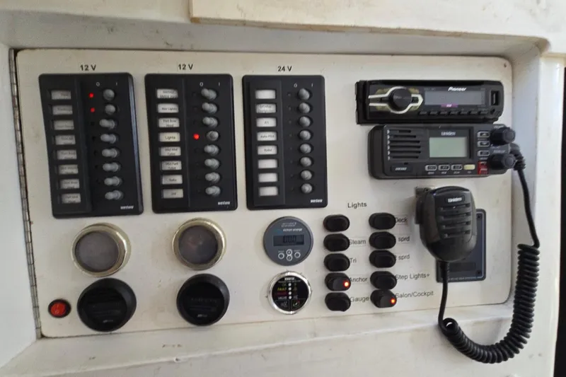  Yacht Photos Pics Control panel of a 2018 Custom Len Jenkins 50 boat with switches and communication devices.