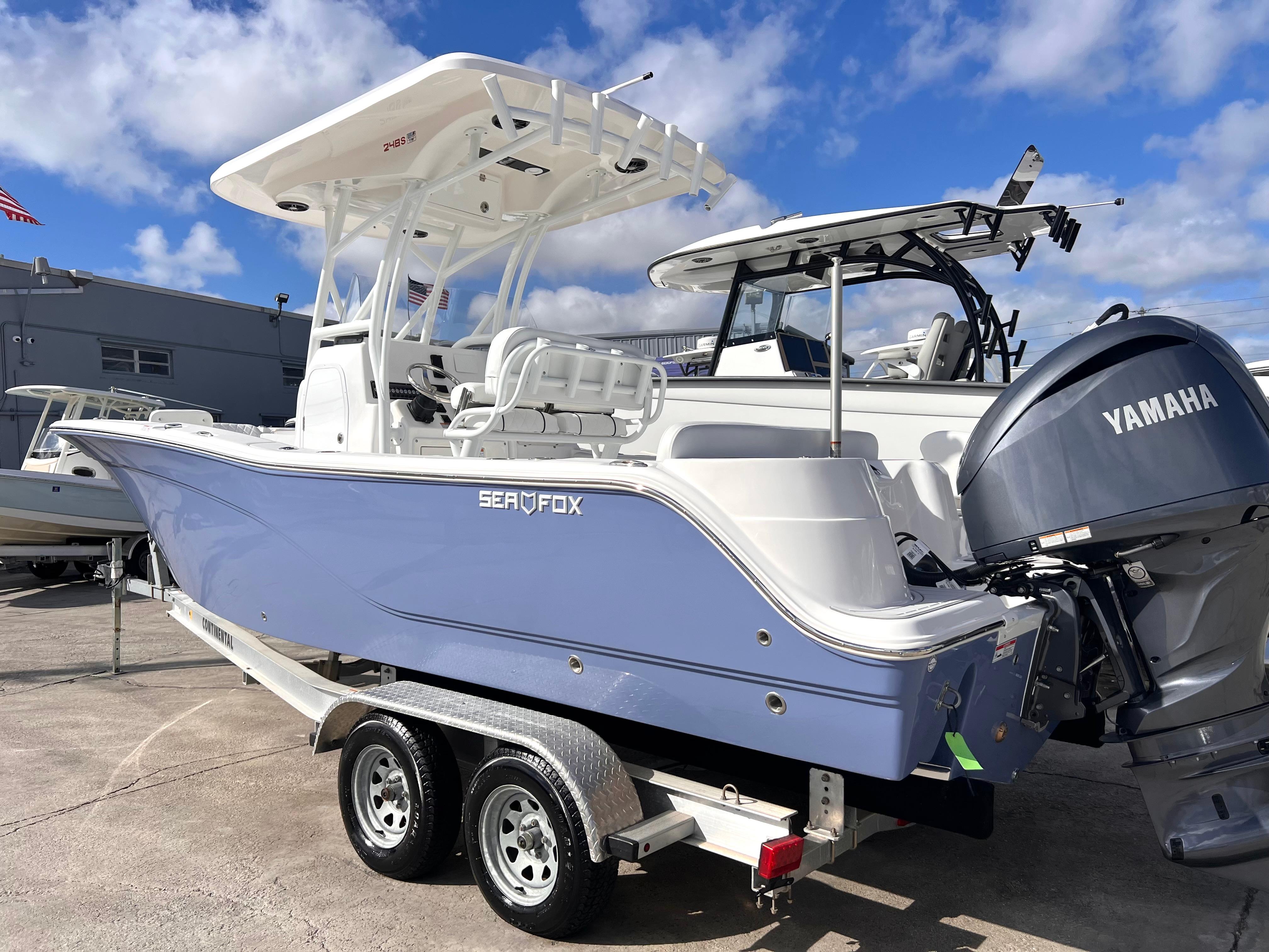 2025 Sea Fox 248 Side Console boat with Yamaha engine on trailer.