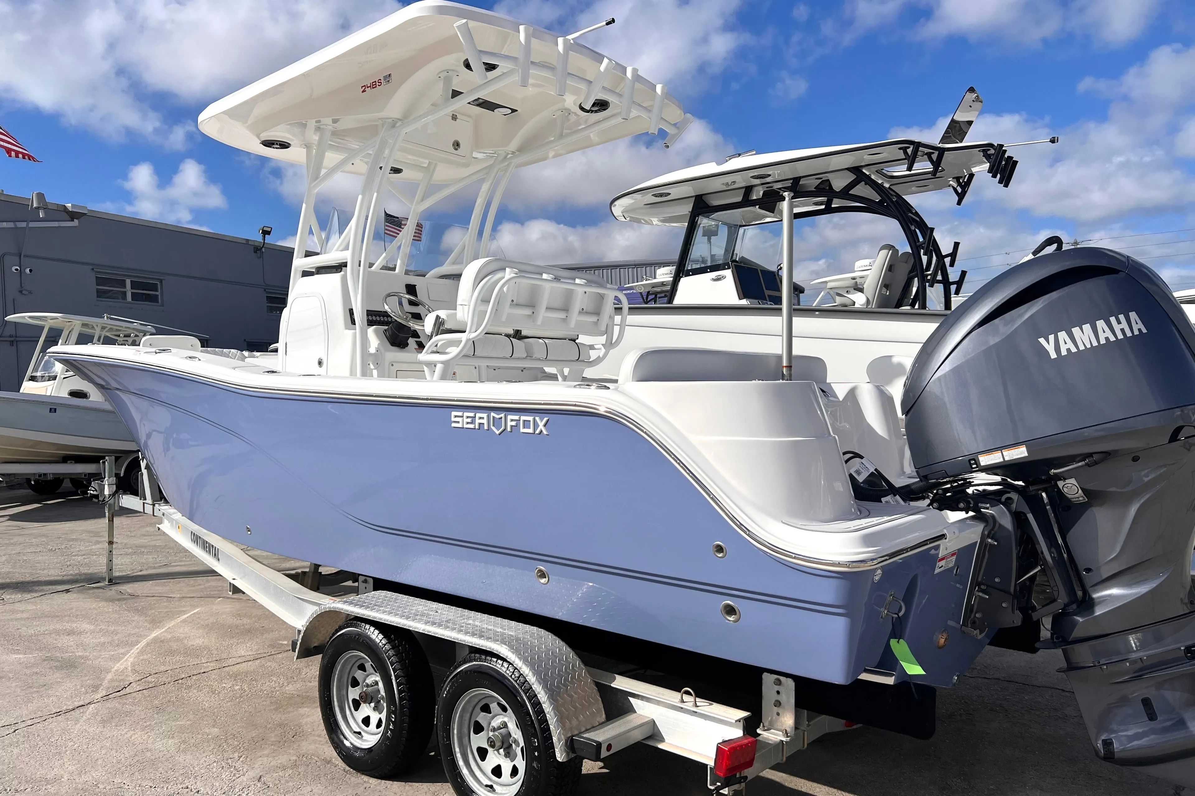 2025 Sea Fox 248 Side Console boat with Yamaha engine on trailer.