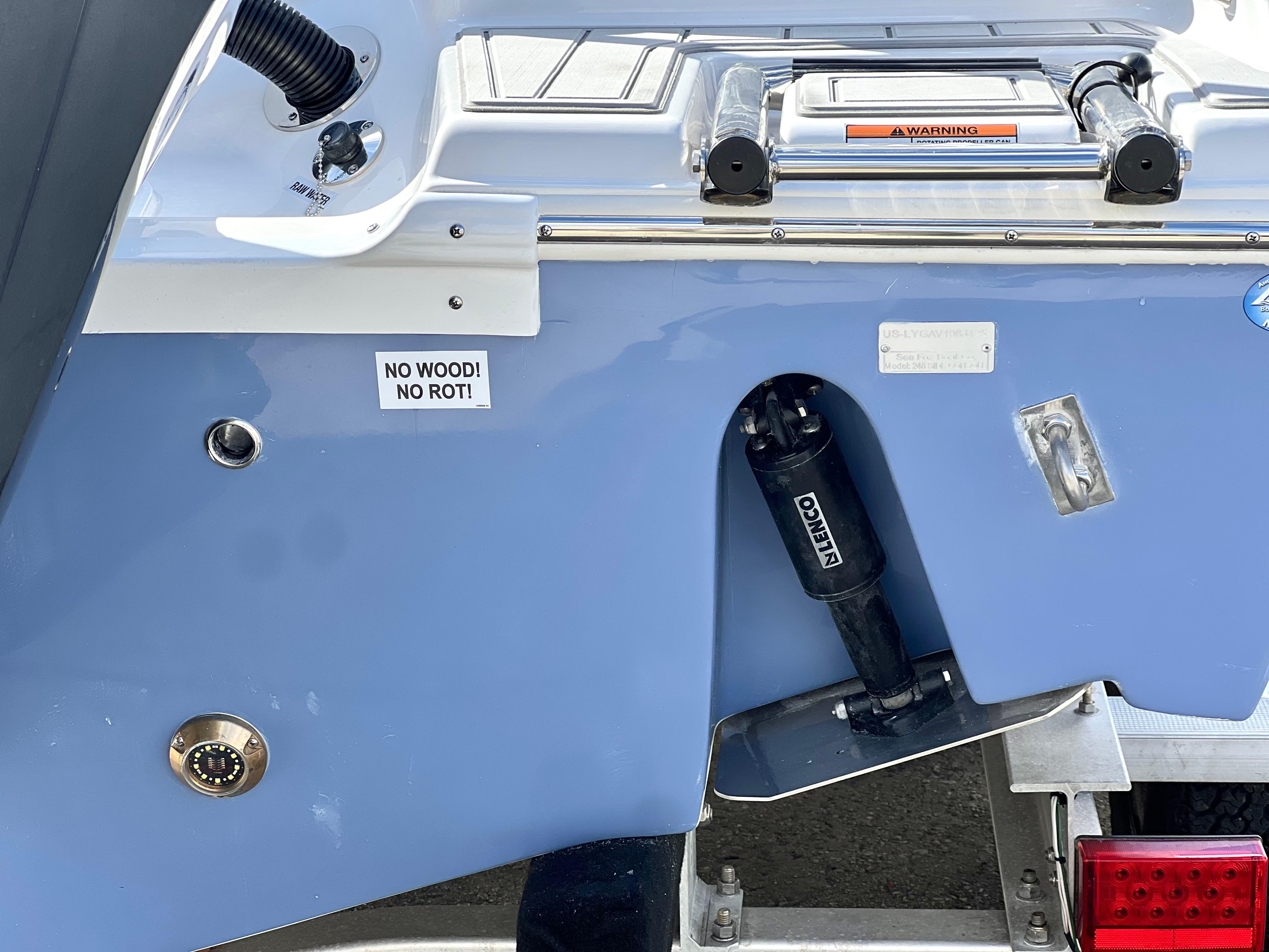 2025 Sea Fox 248 Side Console boat transom with "No Wood! No Rot!" label.
