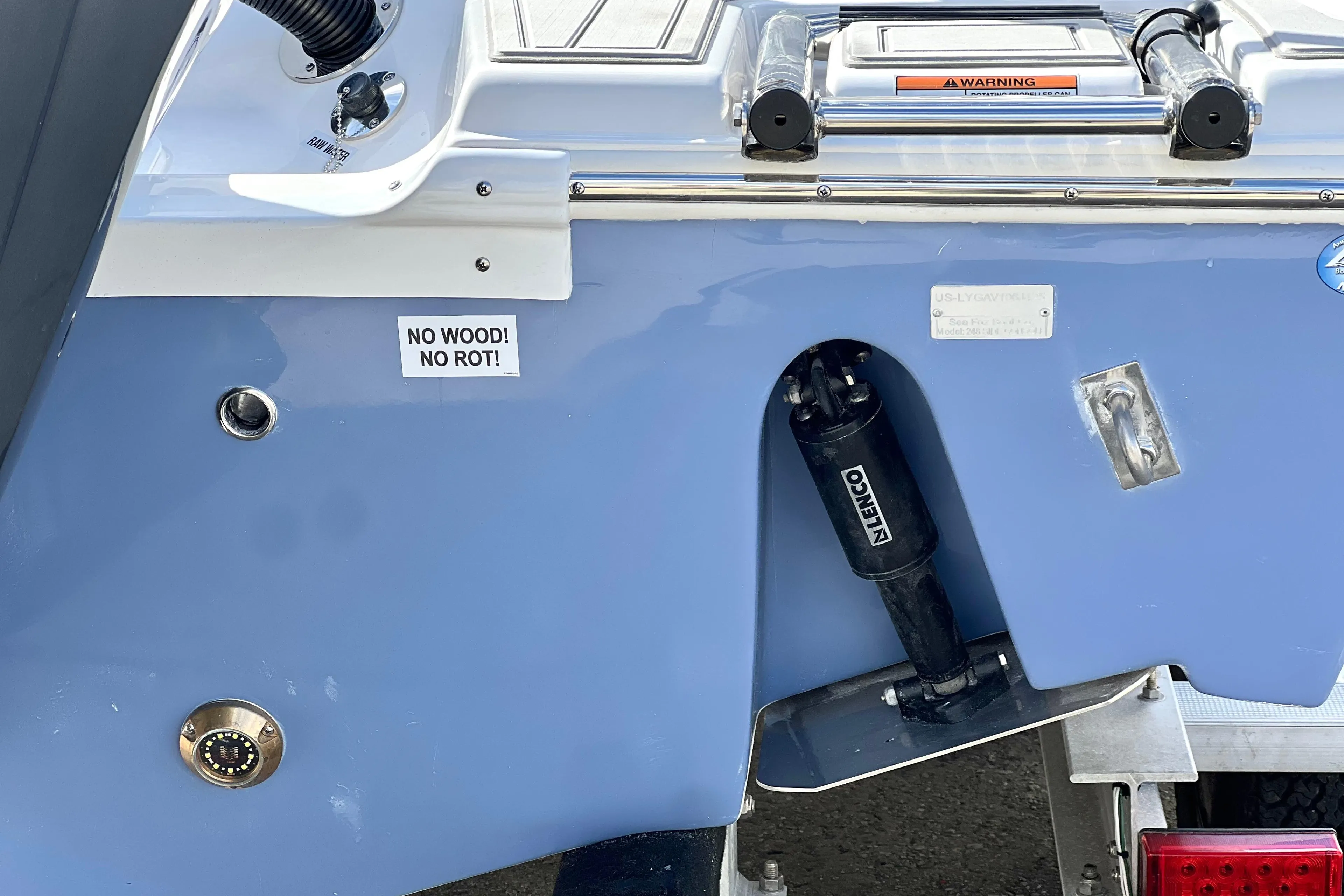 2025 Sea Fox 248 Side Console boat transom with "No Wood! No Rot!" label.