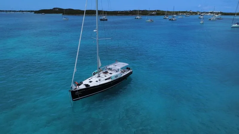 Jump Off Yacht Photos Pics Beneteau Sense 50 yacht sailing in clear blue waters, 2011 model.