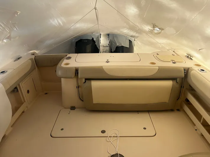  Yacht Photos Pics Interior of a 2011 Grady-White 307 boat, beige upholstery.